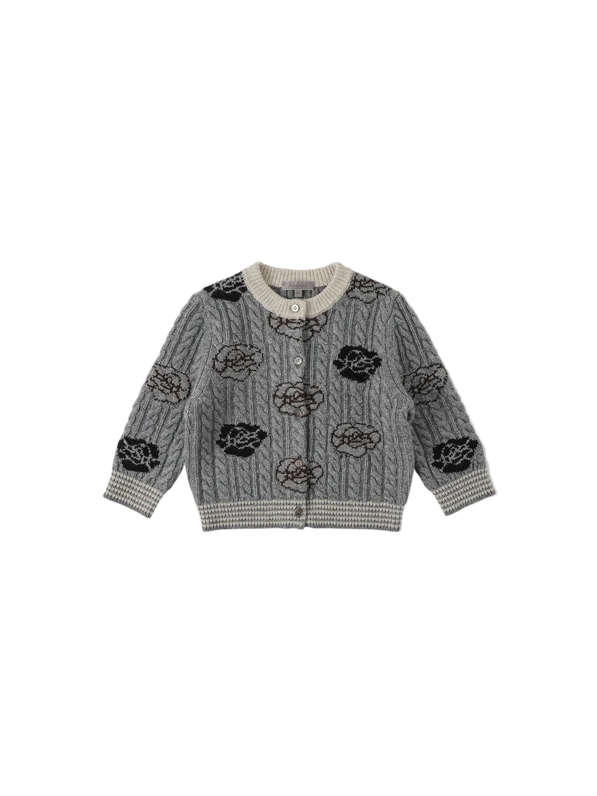 A gray cable-knit cardigan sweater with black embroidered floral and circular patterns, featuring a cream ribbed collar, cuffs, and hem, displayed flat against a light gray background.