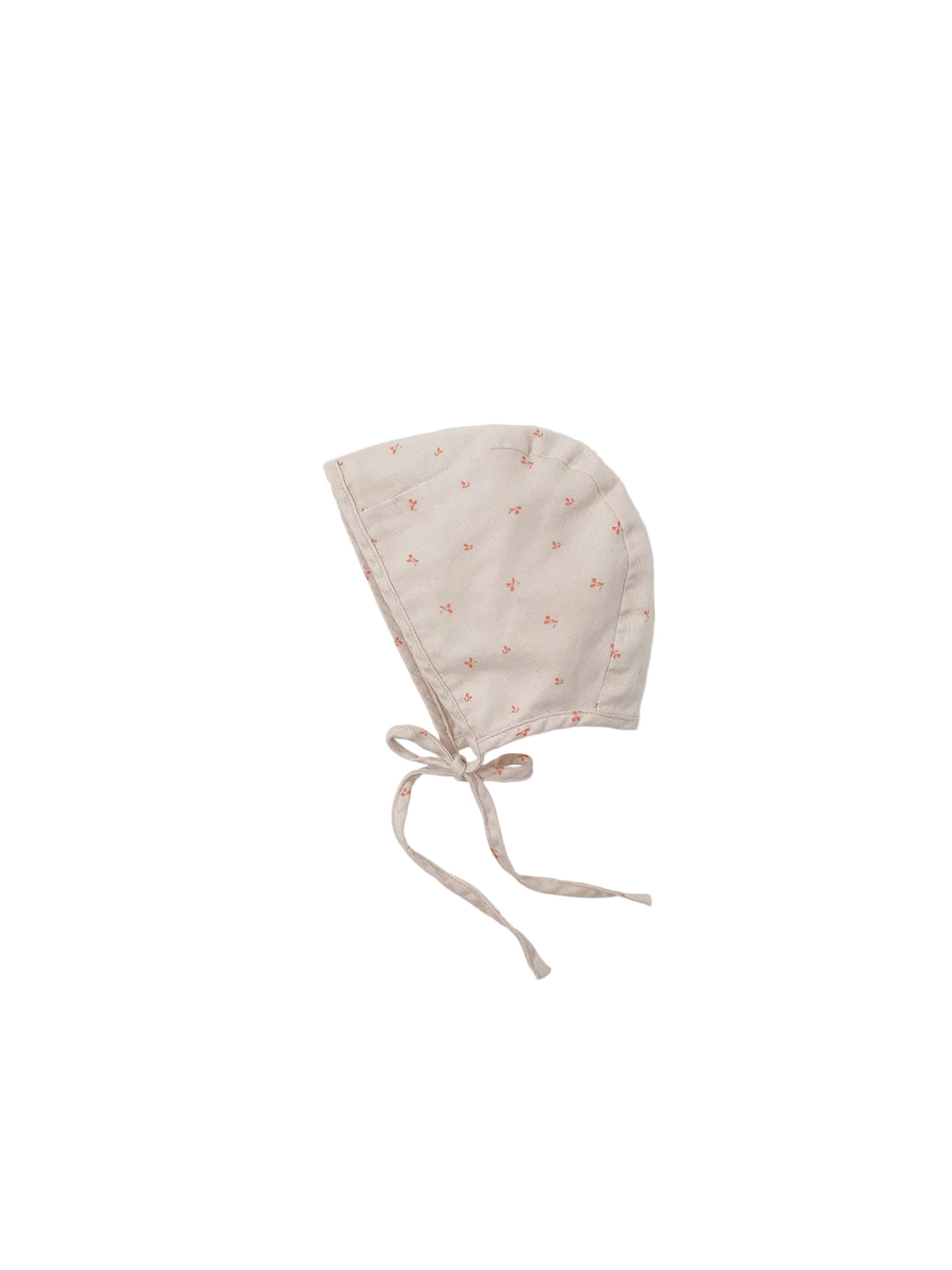 A light beige cotton bonnet with a small orange floral pattern and adjustable drawstrings, shown flat on a light gray background.